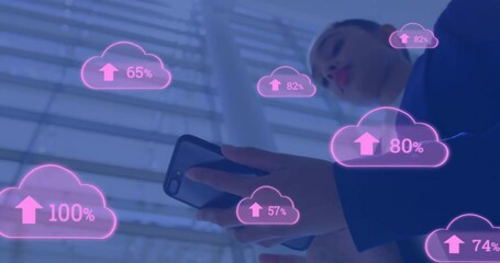 Poster - Animation of cloud icons with growing number over biracial businesswoman using smartphone