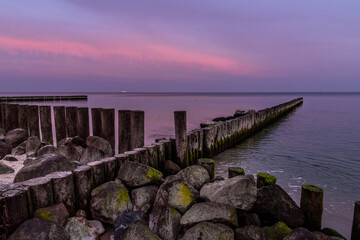 Wall Mural - View on beach of Baltic sea in Svetlogorsk at sunrise. Kaliningrad region. Russia