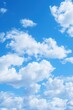 © GalleryGlider - Blue sky with white cloud background