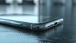 © Fotograf - A close up view of a cell phone placed on a table. Perfect for technology and communication concepts