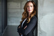 © Hunman - Tech entrepreneur, a full-height portrait of a woman in modern and tech-inspired attire.