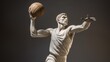 Marble statue of an antique athlete with a basketball in his hands. Sports Lifestyle Concept