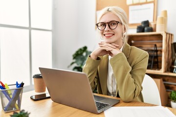 Wall Mural - Young blonde woman business worker using laptop working at office