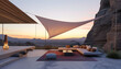 © GrayFrog - Triangle sunshade on a modern minimalistic terrace at sunset