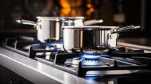 pot on gas stove, stainless pan on the hob, cooking on a gas stove, the cost of gas in Europe