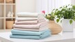© coco - A Neat Stack of Clean Bedding Sheets Against a Blurred Laundry Room Backdrop