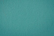 © natavilman - old plastered wall surface for rough textured background or wallpaper of bright blue color, close-up