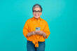 © deagreez - Portrait photo of gray haired retired amazed business woman using smartphone at office coffee break isolated on blue color background