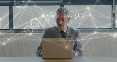 Poster - Animation of statistics and data processing over caucasian businessman using laptop in office