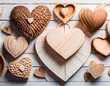 Wooden hearts on white wooden background. Valentine's day concept.
