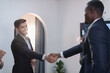 © S photographer - Businessmen shake hands and congratulate each other in the conference room.