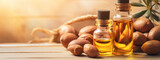 argan essential oil on a wooden background.