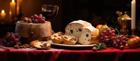 Wall Mural - Holiday Panettone with raisins and dried fruits on a red tabletop, adorned with champagne and Christmas decorations, offering a warm and cozy seasonal ambiance.