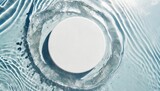 Fototapeta Kosmos - empty white circle podium on clear calm water texture with splashes and waves in sunlight abstract nature background for product presentation flat lay cosmetic mockup copy space
