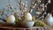 Easter table decoration with egg shells, spanish moss and catkins with copy space.
