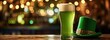 Green color beer on a wooden table Leprachauns hat behind beer, bokeh background