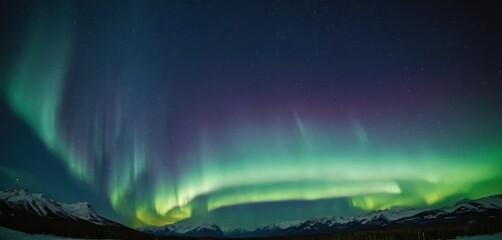 a bright green and purple aurora bore in the sky above a snow covered mountain range with snow - cap