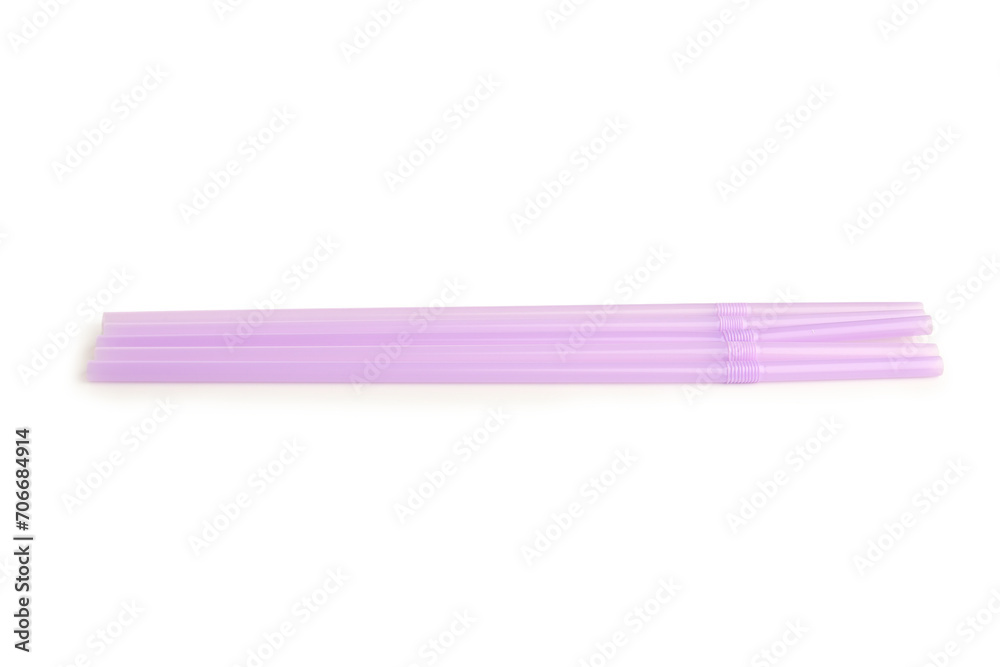 Purple plastic straws on white background