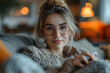 © Gonzalo - Profile photo of nice minded lady sitting couch arm touch chin living room flat indoors