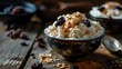 Cottage cheese with raisins and nuts in a bowl on a dark wooden background.