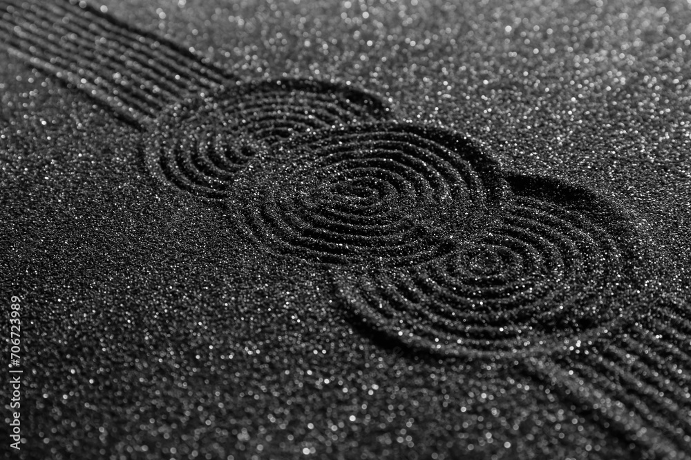 Dark sand with lines. Zen concept