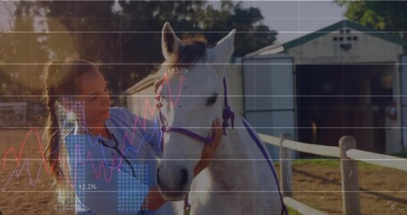 Canvas Print - Animation of financial data processing over caucasian woman with horse