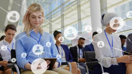 Poster - Animation of network of connections with icons over diverse business people in conference