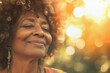 © lermont51 - Elderly black woman enjoying a moment with a smile, eyes closed