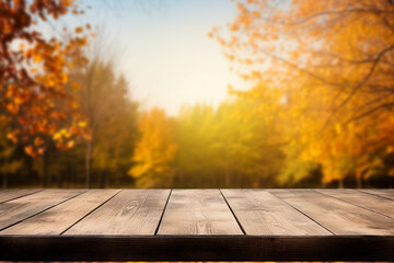 Wall Mural - Empty wooden top table with blurred autumn background.