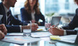 © Natali - Business formal meeting conference discussion with coworker shareholder or client concentrate private ideas data report analysis businesspeople working find solution together in office digital photo