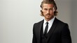 © mariiaplo - Portrait of blond man in black classic suit and tie, Business concept