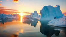 The Quiet Stillness Of The Polar Regions Is Disrupted By The Thunderous Crack Of Melting Glaciers And The Crashing Of Chunks Of Icebergs Into The Frigid Waters Below.