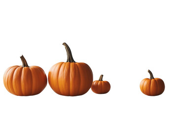 Three bright orange pumpkins on a white table fall or Thanksgiving background