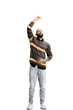 © Katsiaryna - A man, on a white background, in full height, raised his hand