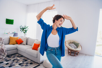 Poster - Photo of overjoyed cheerful girl dancing alone celebrating purchase bought new flat