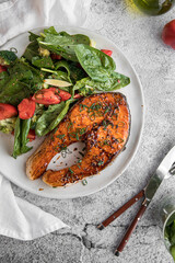 Wall Mural - Portion of gourmet grilled salmon steak with vegetables