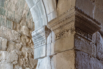 Wall Mural - Capitals and columns in down passage of Miletus ancient theater. Milet (Aydin), Turkey (Turkiye)