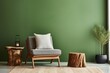 Fabric lounge chair and wood stump side table against green stucco wall with copy space. Rustic minimalist home interior design of modern living room
