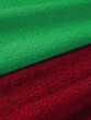 example of bath towel color. light green and carmine red. macro.​