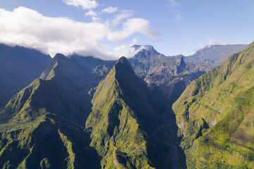 Wall Mural - The Cap Noir Belvedere and Roche Verre Bouteille, aerial view by drone of the Cirque de Mafate, Reunion Island