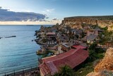 Fototapeta  - view of idyllic Anchor Bay and Popeye Village amusement park in Malta