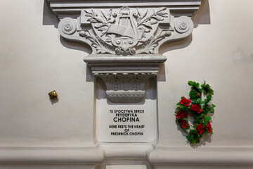 Wall Mural - Warsaw, Poland. Funerary monument on a pillar in Holy Cross Church, enclosing Frederic Chopin's heart