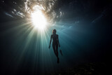 Fototapeta Do akwarium - Freediver woman, underwater view.