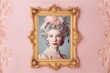 baroque woman portrait in gold frame hanging on the pink wall