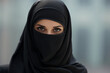 © serperm73 - Face of a woman in a niqab, close-up, eyes.