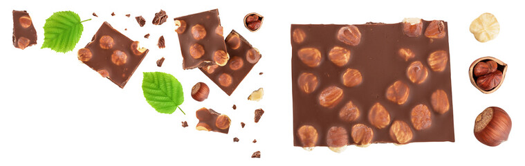 Wall Mural - Chocolate with hazelnuts isolated on white background with full depth of field. Top view. Flat lay