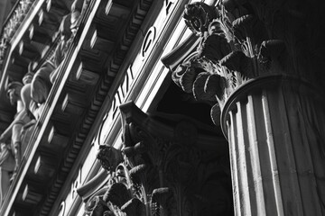 Poster - A black and white photo of a clock on a building. Suitable for various applications