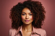 © Synthetica - Beautiful african american woman with curly hair on pink background
