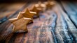 Wooden stars arranged in a row, symbolizing a satisfaction rating system used for evaluating customer feedback, service quality, or product excellence.