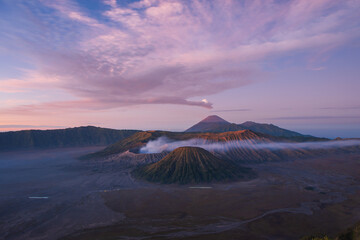 Wall Mural - Mount Bromo in beautiful sunrise, with sea of cloud. An active volcano in Java, Indonesia
